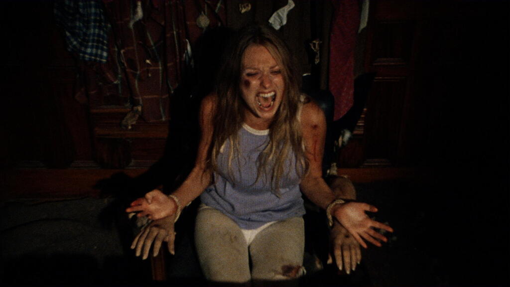 Ma’am, they only invited you to dinner. Why make a scene? From ‘The Texas Chain Saw Massacre’ (Photo: The Jerusalem Film Festival)) מתוך "המנסרים מטקסס"