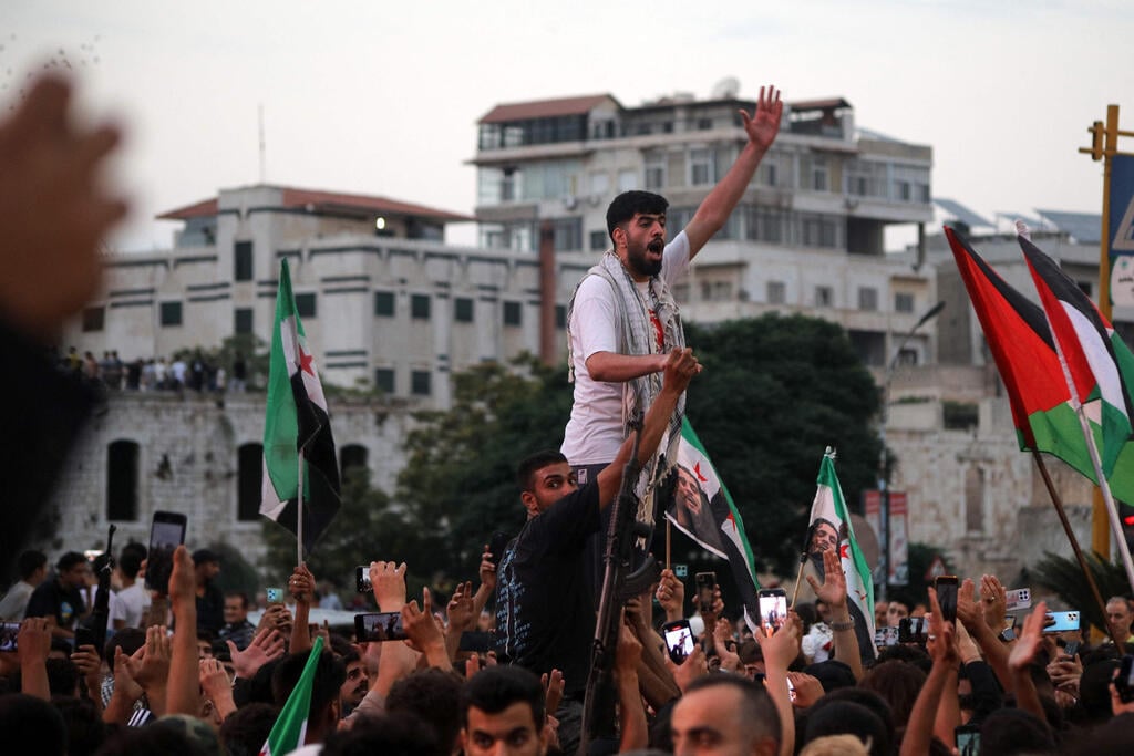 צילום: Rami al SAYED / AFP הפגנות בדמשק נגד התקיפות הישראליות