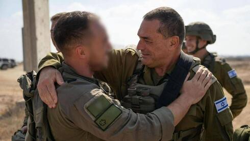 IDF chief meets son, reserve tank commander, during tour of forces in Gaza