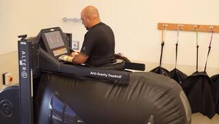Shai Pinker walks on an anti-gravity treadmill