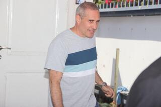 חבר הכנסת חנוך מילביצקי יוצא מהחקירה ב-433