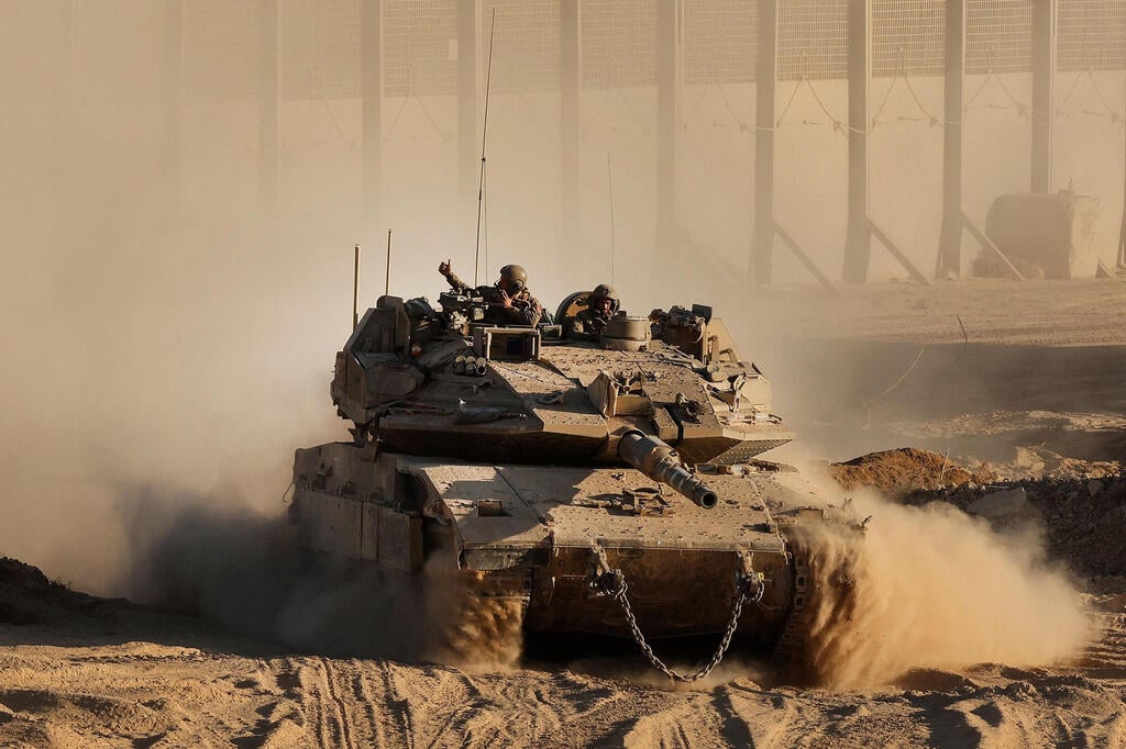 טנק בגבול רצועת עזה (צילום: Jack GUEZ / AFP) כוחות צה"ל בגבול רצועת עזה