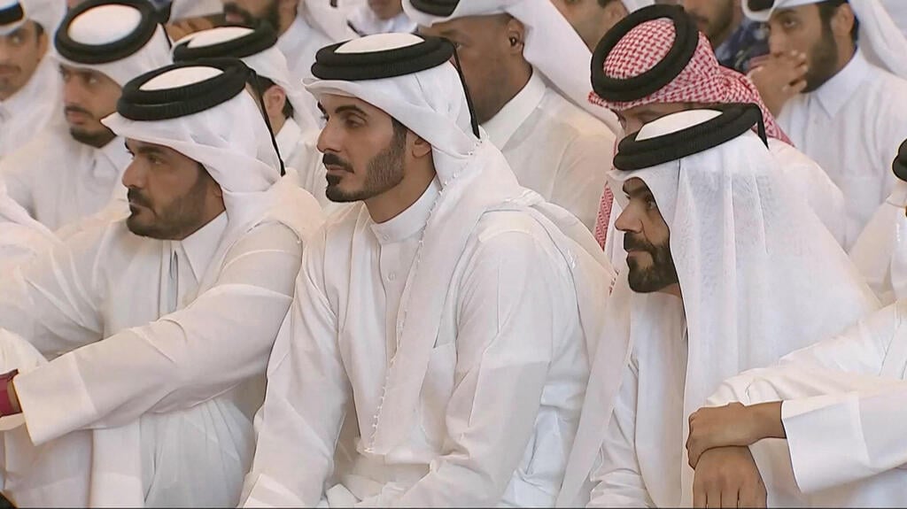 צילום: Qatar TV/Reuters TV via REUTERS הלווייתם של המחוסלים בתקיפה הישראלית בדוחא