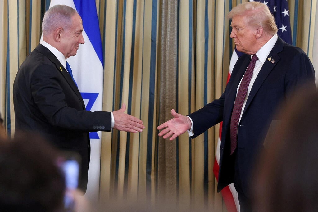 Photo: REUTERS/Jonathan Ernst נתניהו וטראמפ במסיבת עיתונאים בבית הלבן
