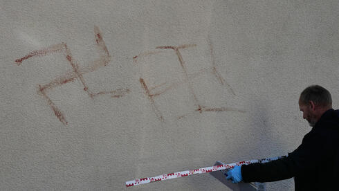 Germany: Swastikas painted in human blood