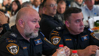 מני בנימין לצד בועז בלט