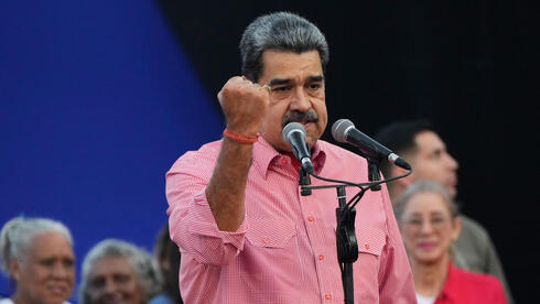 Venezuela’s Maduro sings John Lennon for peace