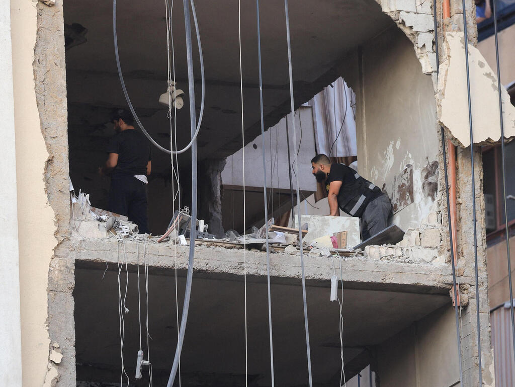צילום: REUTERS/Mohamed Azakir תקיפה בדאחייה