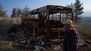 Ilan Rosenfeld walks through the burnt-out shell of his business in Metula, a small war-ravaged town pressed up against the Israel-Lebanon border, Sunday, Nov. 30, 2025 