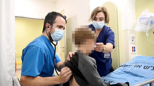 1st Israeli hospital reinstates masking as flu soars