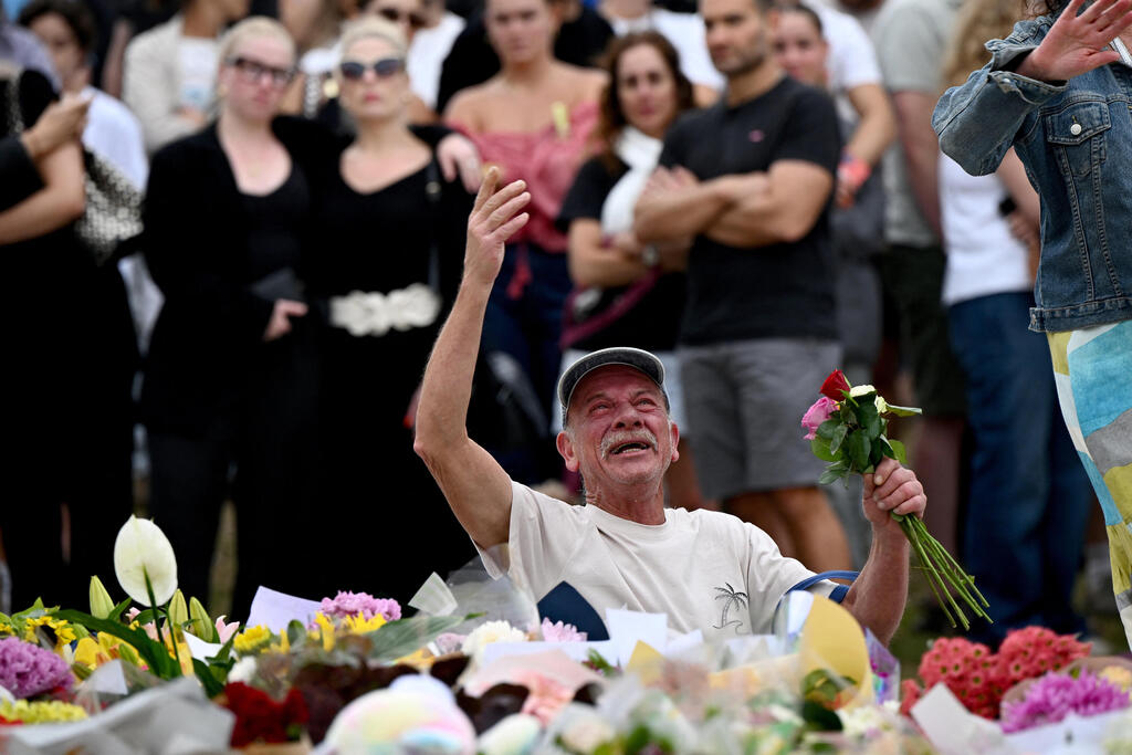 צילום: AAP/Bianca De Marchi via REUTERS סידני חוף בונדיי יום אחרי הטבח