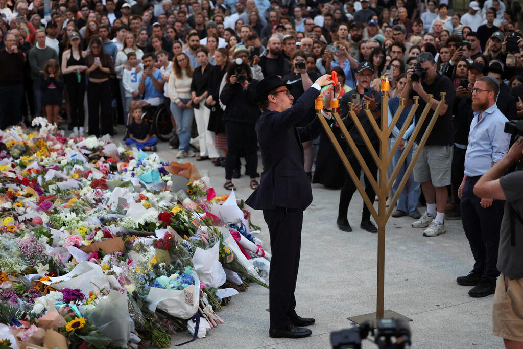 צילום: REUTERS/Hollie Adams סידני חוף בונדיי יום אחרי הטבח