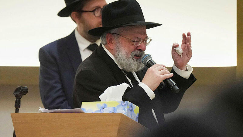 הרב יהורם אולמן (צילום: Mark Baker / POOL / AFP) הרב יהרום אולמן הלוויה אלי שלנגר חנוכה סידני בונדיי אוסטרליה