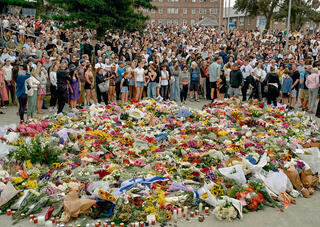 אתר הפיגוע בסידני. "איך נחיה מעכשיו והלאה, אין לי מושג", אמר לי חבר אוסטרלי־יהודי | צילום: AFP/SAEED KHAN