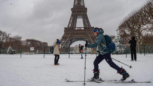 Heavy snow hits Europe: Paris turns white, skiing by Eiffel Tower, flights canceled