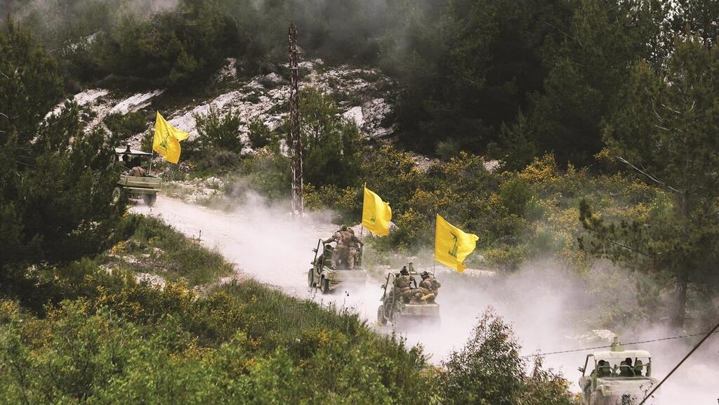 Hezbollah Terrorists (Photo: Aziz Taher/Reuters) מחבלי חיזבאללה בגבול הצפון