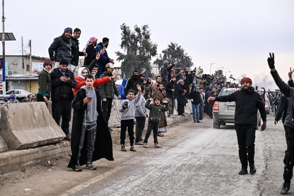 Photo: Abdulmonam Eassa/Getty Images עימותים בין משטר א-שרע לכורדים