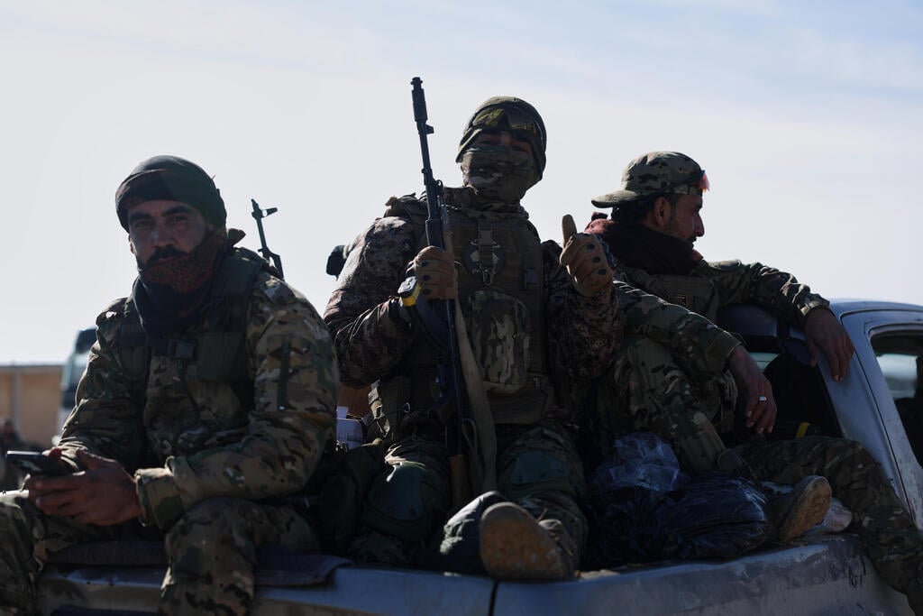 Syrian government forces (Photo: AP Photo/Ghaith Alsayed) סוריה כוחות המשטר ב מחנה אל-הול שבו כלואות משפחות של אנשי דאעש