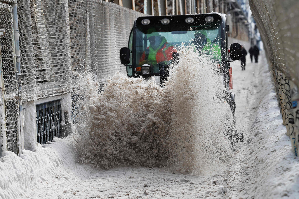צילום: SPENCER PLATT / GETTY IMAGES NORTH AMERICA / AFP ארה"ב סופה סופת שלגים ניו יורק
