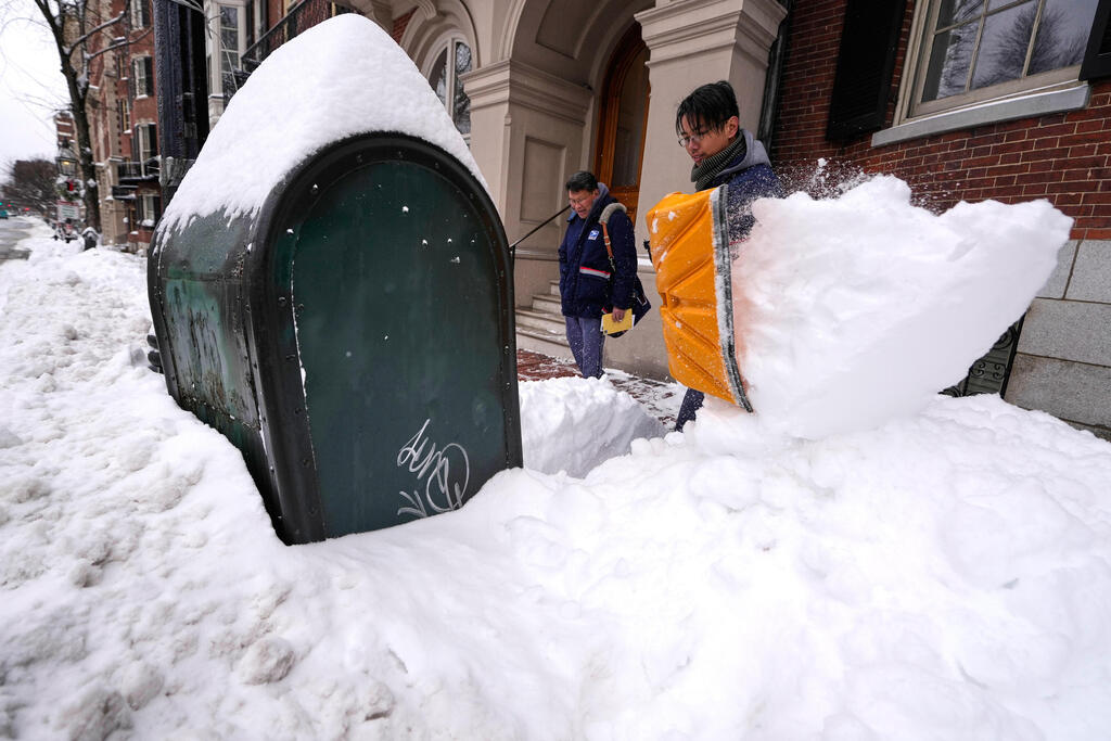צילום: Scott Eisen / GETTY IMAGES NORTH AMERICA / AFP ארה"ב סופה סופת שלגים בוסטון