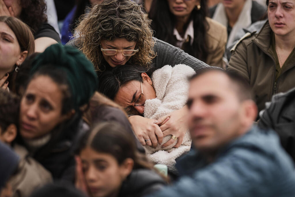 צילום:AP Photo/Leo Correa רס"ר רן גואילי ז"ל מובא למנוחות