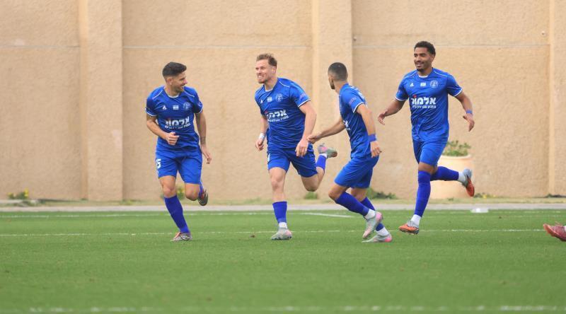 שחקני הפועל עכו חוגגים (חג'אג' רחאל) שחקני הפועל עכו חוגגים