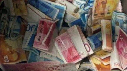 Police seize millions in cash in raids on crime clans