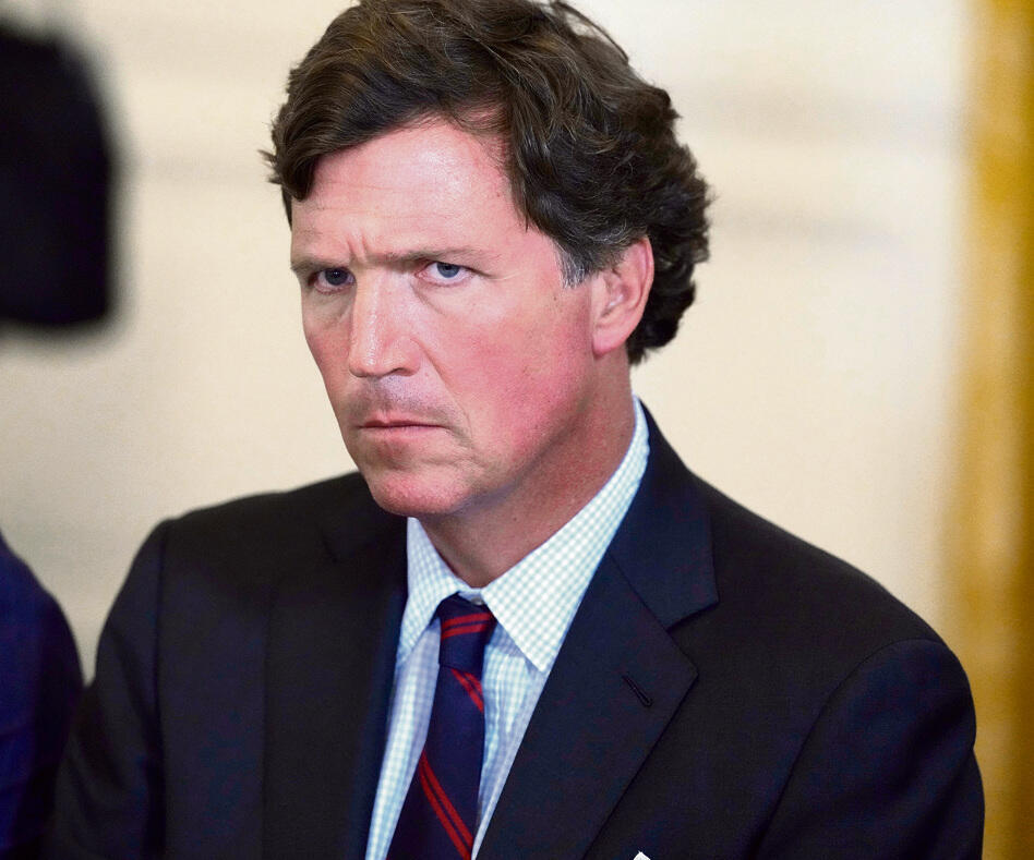 טאקר קרלסון. את מכחישי השואה ראיין באהדה, את השגריר האקבי - בזעם | צילום:אי-פי, Alex Brandon