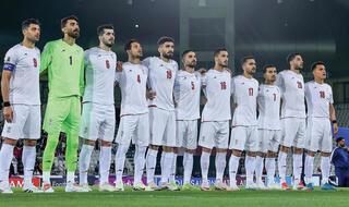 נבחרת איראן לפני המשחק מול  קטאר בשנה שעברה. העפילו  ויישארו בחוץ?