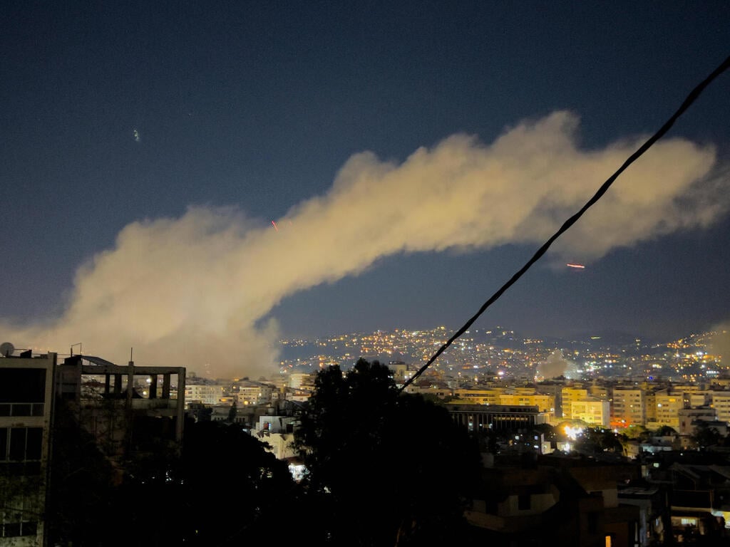 Photo: AP Photo/Hussein Malla תקיפות ישראליות בפרברים הדרומיים של ביירות, לבנון