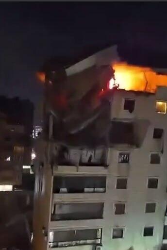 Fire at an apartment in the Dahieh suburb of Beirut after an Israeli airstrike דירה בדאחייה עולה באש לאחר התקיפות