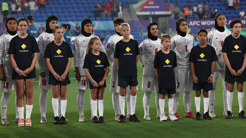 Watch: Iran women's soccer team stands silent during anthem as war rages back home