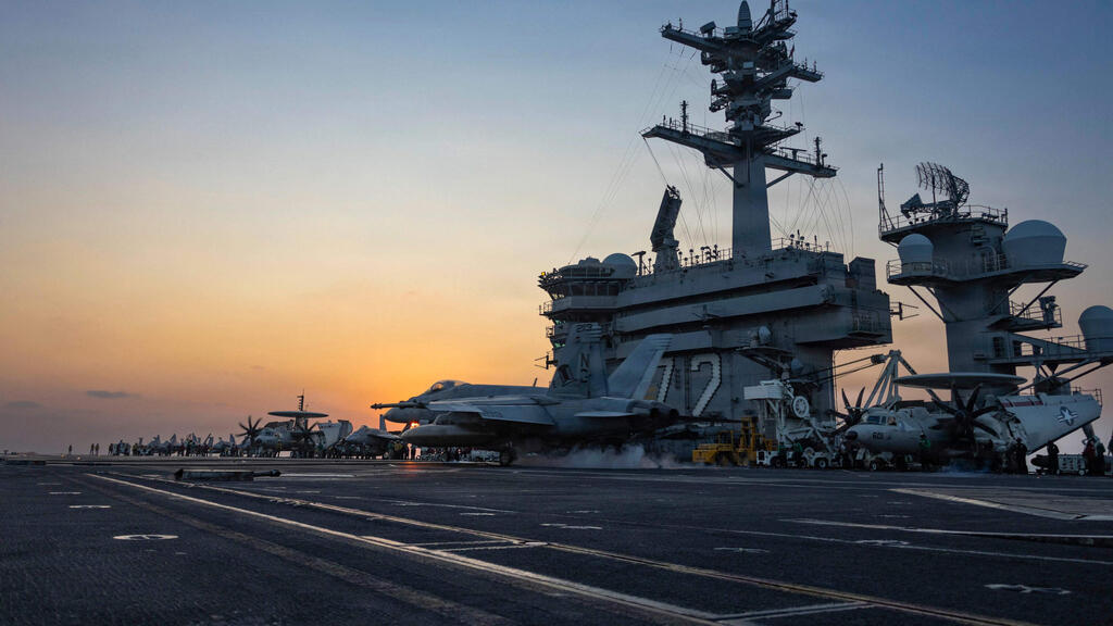 USS Abraham Lincoln aircraft carrier (Photo: AFP/ US NAVY / US CENTRAL COMMAND PUBLIC AFFAIRS) נושאת המטוסים אברהם לינקולן