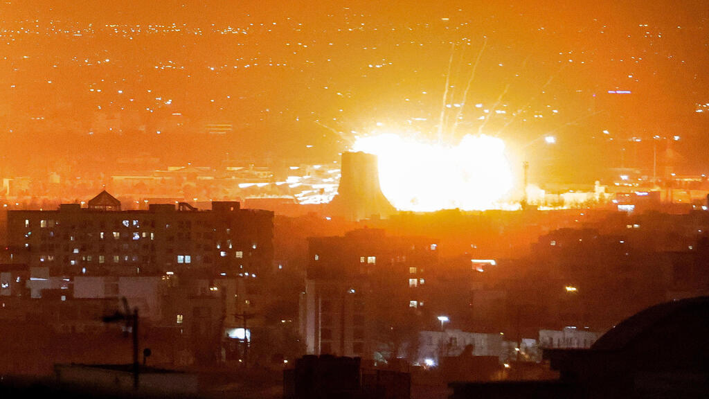 צילום: ATTA KENARE / AFP תקיפות בטהרן