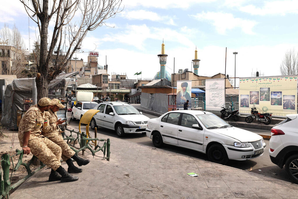 Photo: ATTA KENARE / AFP טהרן איראן שבוע מתחילת המלחמה