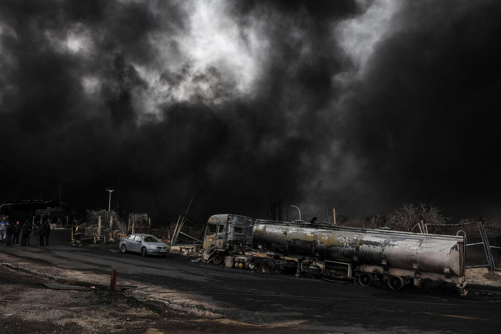 צילום: Majid Asgaripour/WANA (West Asia News Agency) via REUTERS שמי טהרן מלאים בעשן כתוצאה מתקיפה