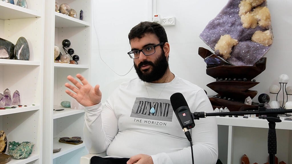 Haim surrounded by his crystal collection (Photo: Bar Gindy) Haim surrounded by his crystal collection