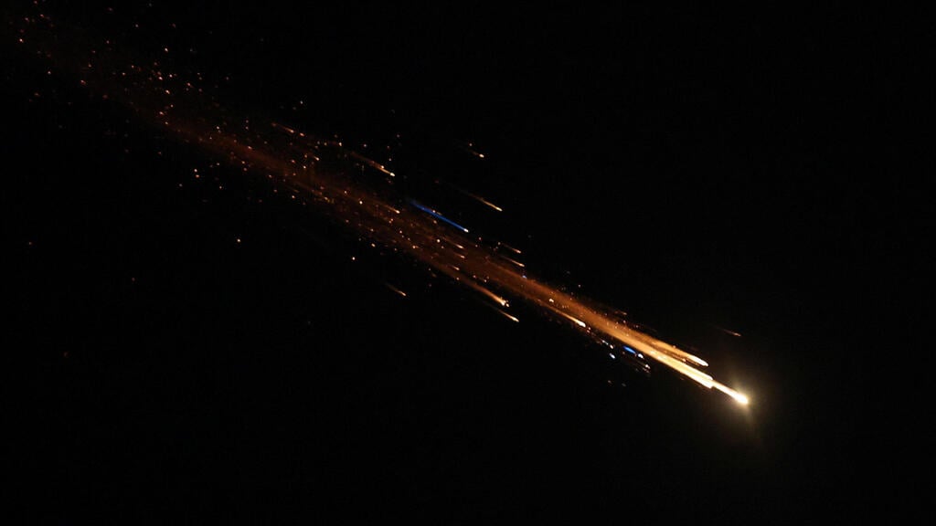 Interception above Jerusalem (Photo: Reuters/Ammar Awad) יירוט טיל איראני בשמי ירושלים