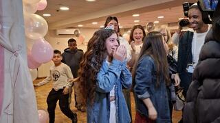    Liraz is surprised by the alternative bat mitzvah event organized for her