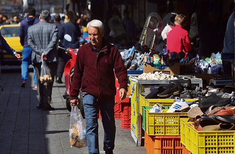 שוק בטהרן (Majid Asgaripour, via REUTERS) שוק בטהרן