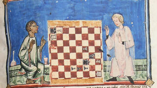 שחמטאי כהה עור עומד לנצח מול איש דת בהיר עור. מתוך כתב היד שהוזמן על ידי אלפונסו העשירי, מלך קסטיליה שחמטאי כהה עור עומד לנצח מול איש דת בהיר עור. מתוך כתב היד שהוזמן על ידי אלפונסו העשירי, מלך קסטיליה