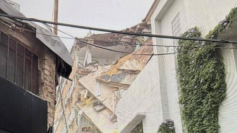 קומה קרסה בבניין בתל אביב-יפו, אישה חולצה במצב בינוני