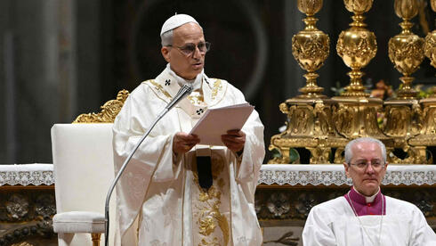 Pope Leo urges world not to grow numb to war during his first Easter vigil