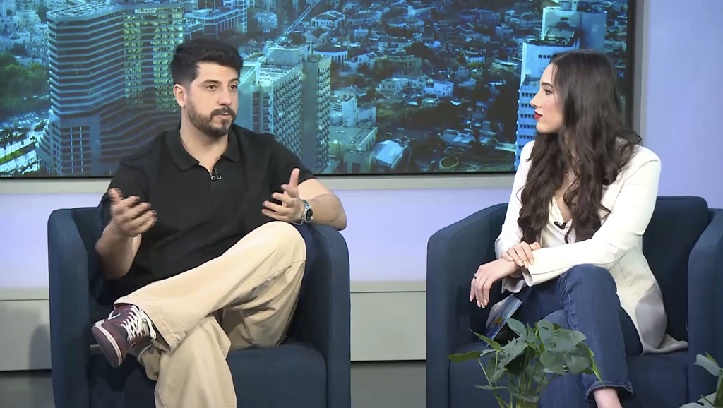 'balancing humor with the weight of current events', guest stand up comedian Matan Peretz and India Naftali (Photo: Screengrab) All Caps episode 4