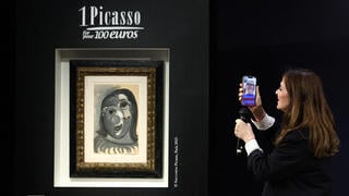 Ari Hodara learns via video call that he has won the Picasso painting 'Head of a Woman' in a charity raffle in Paris 