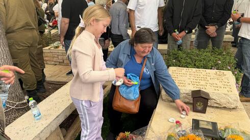 Daughter born from fallen soldier’s sperm visits his grave: ‘My father is a hero,’ she says