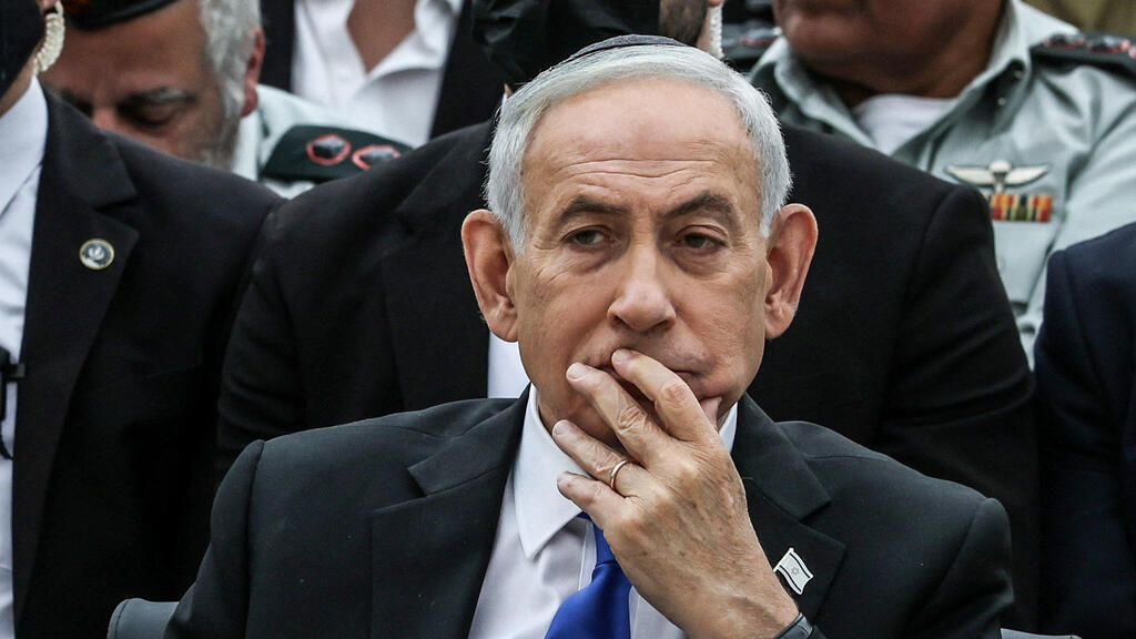 נתניהו. קאן אמר לעובדת שעל פי החשד תקף: "תחשבי על צווי המעצר הפלסטיניים" (צילום: ILIA YEFIMOVICH/Pool via REUTERS) טקס האזכרה הממלכתי לחללי פעולות האיבה בהר הרצל