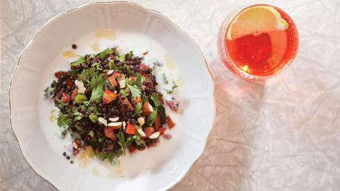 Easy black lentil salad recipe with toasted almonds and herbs