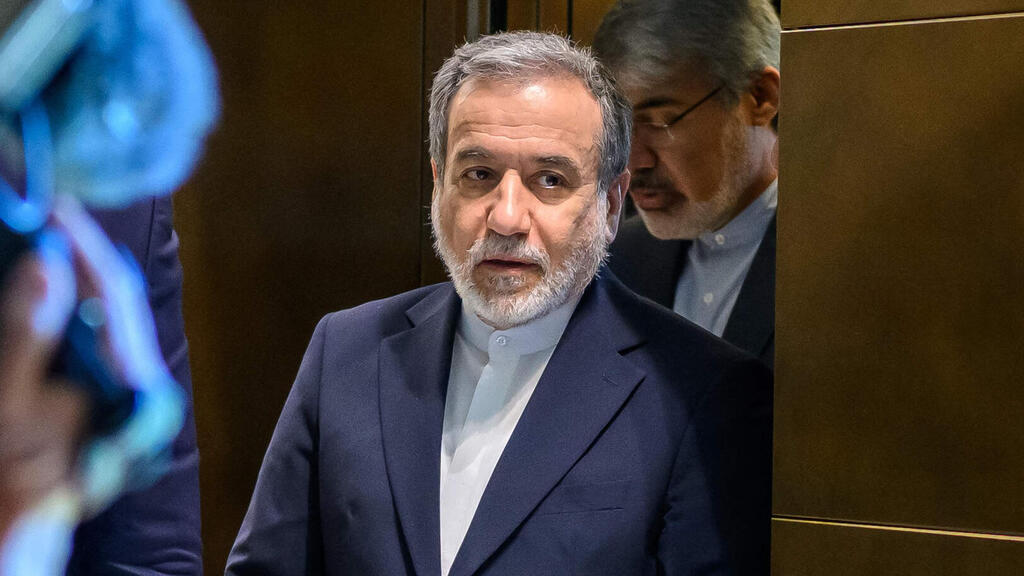 עראקצ'י (צילום: Fabrice Coffrini / POOL / AFP) פסגת שיחות איראן- ארה"ב בשווייץ