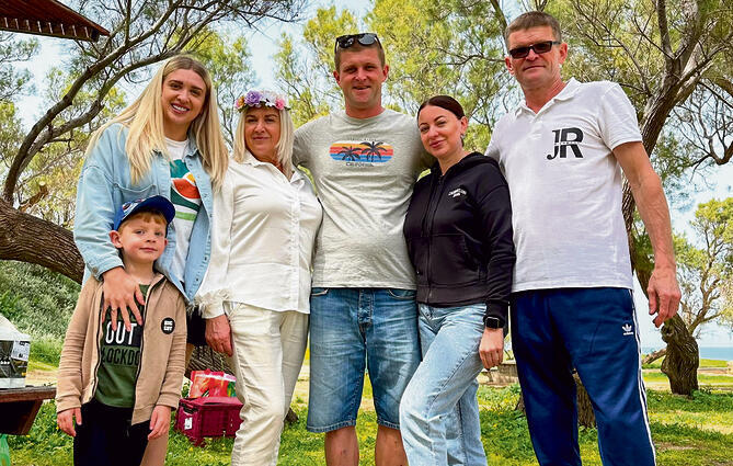 התמונה המשפחתית האחרונה. מימין: ויטלי, קטיה וולדימיר לוגבינצ׳נקו
